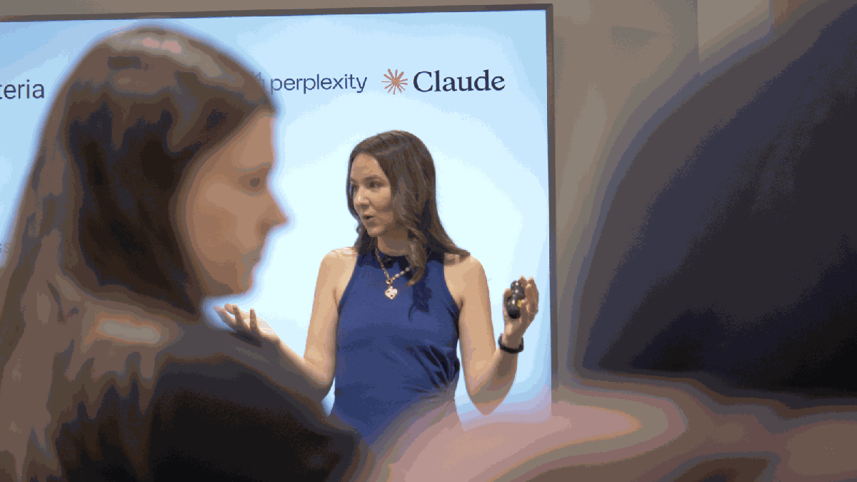 Dr. Joan Palmiter Bajorek presenting a Claude workshop with Perplexity and Claude logos on screen